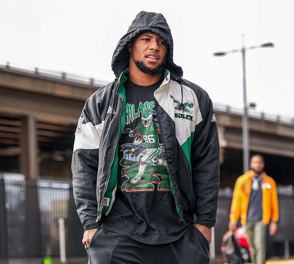 Saquon Barkley of the Philadelphia Eagles wearing Philly Sports Shirts Shirt into the stadium