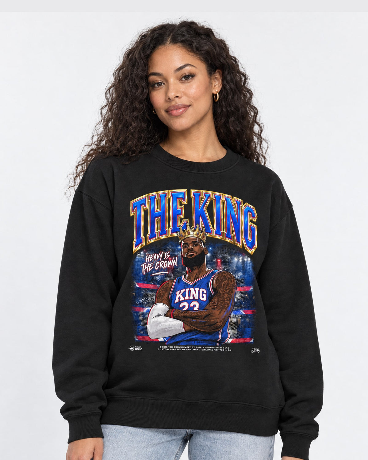 Female model wearing the king lebron james crewneck sweatshirt by Philly Sports Shirts