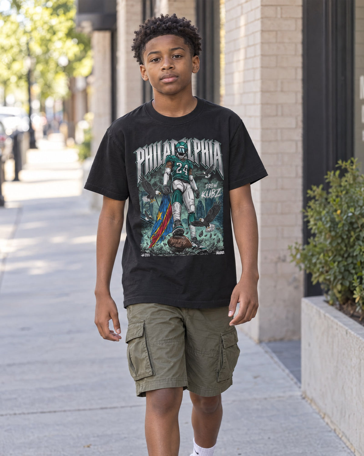 Kid wearing Mukuba x Philly Sports Shirts No Fly Zone Shirt