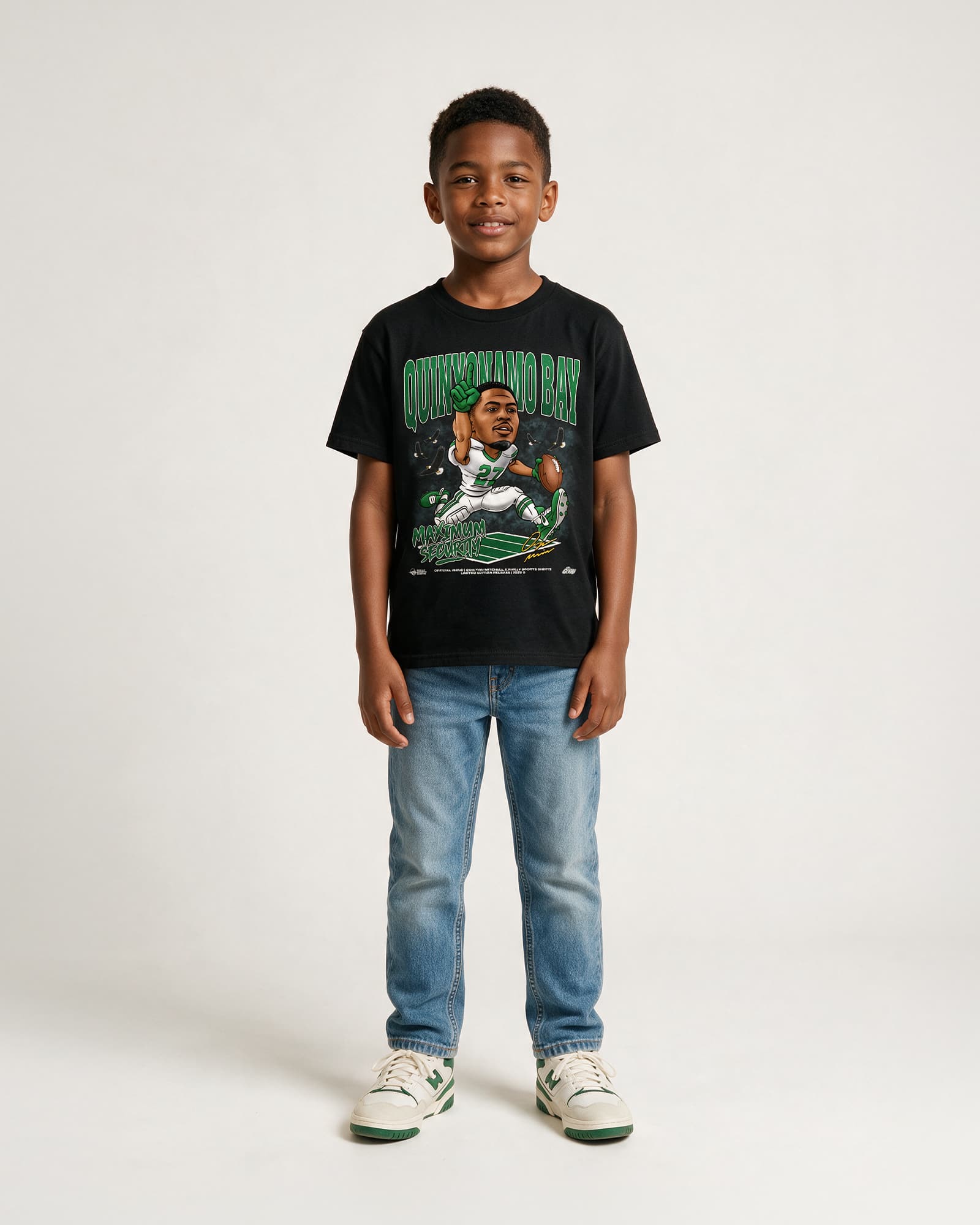Kid wearing youth Quinyonamo Bay Maximum Security Eagles Football T-Shirt