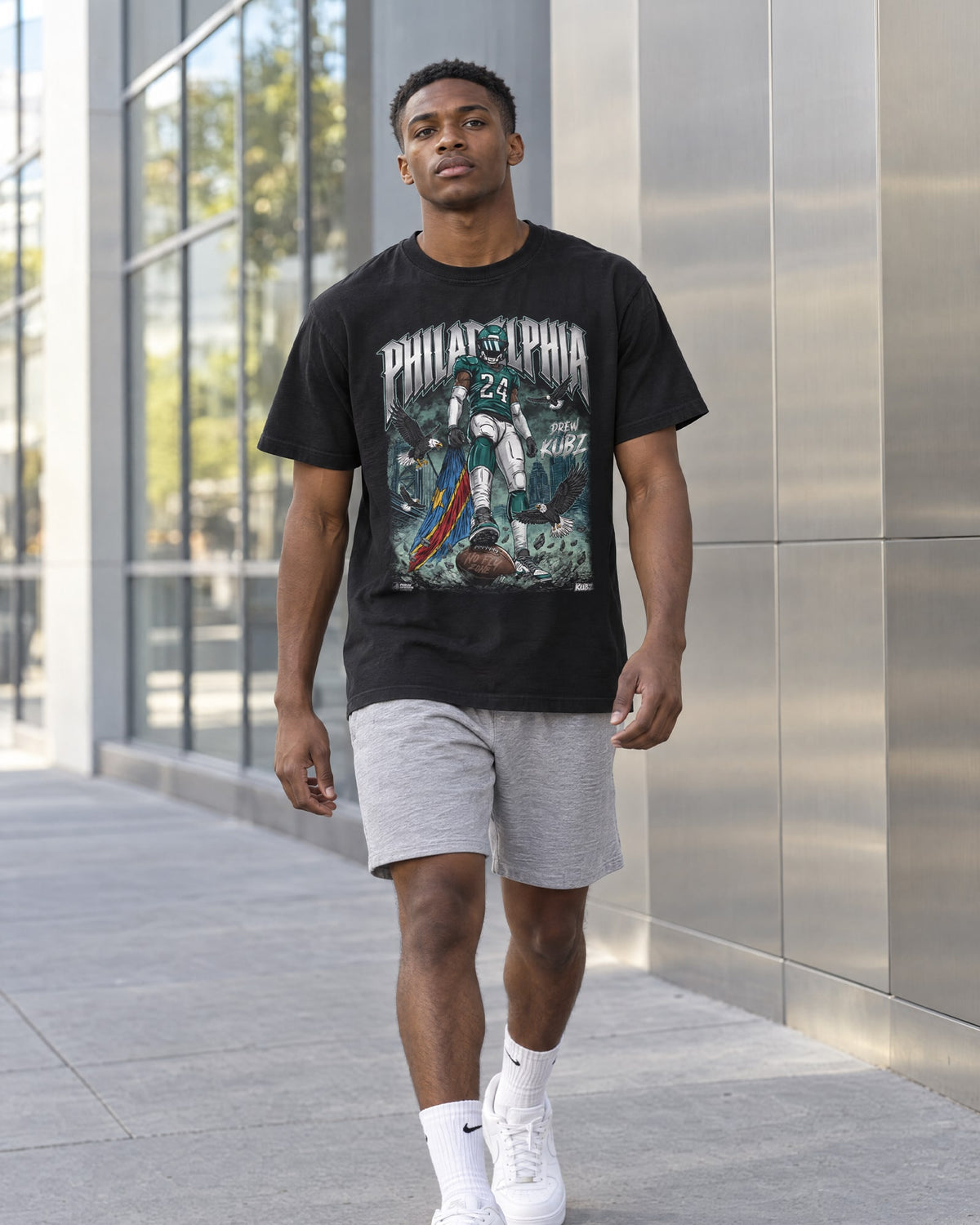 Model wearing Andrew Mukuba No Fly Zone shirt in collaboration with Philly Sports Shirts
